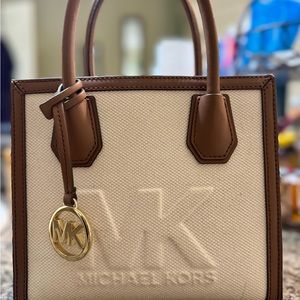 Small Michael Kors leather canvas bag that was only worn once.